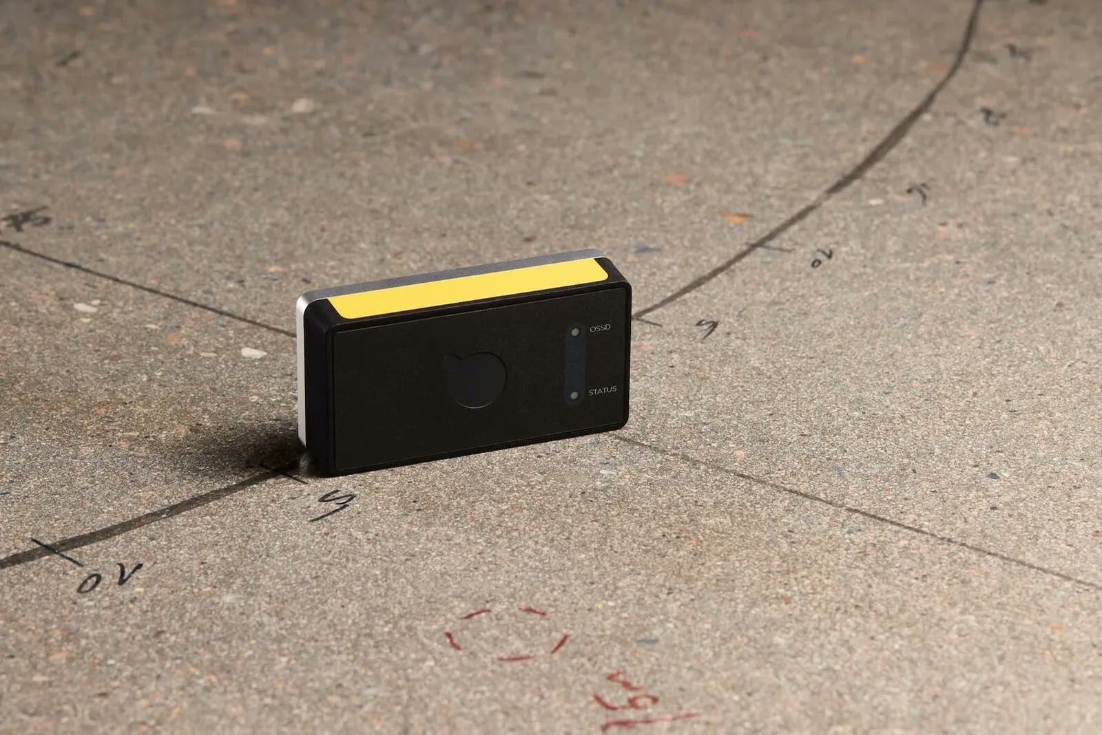 ADAR One sensor unit, close-up on a marked industrial surface